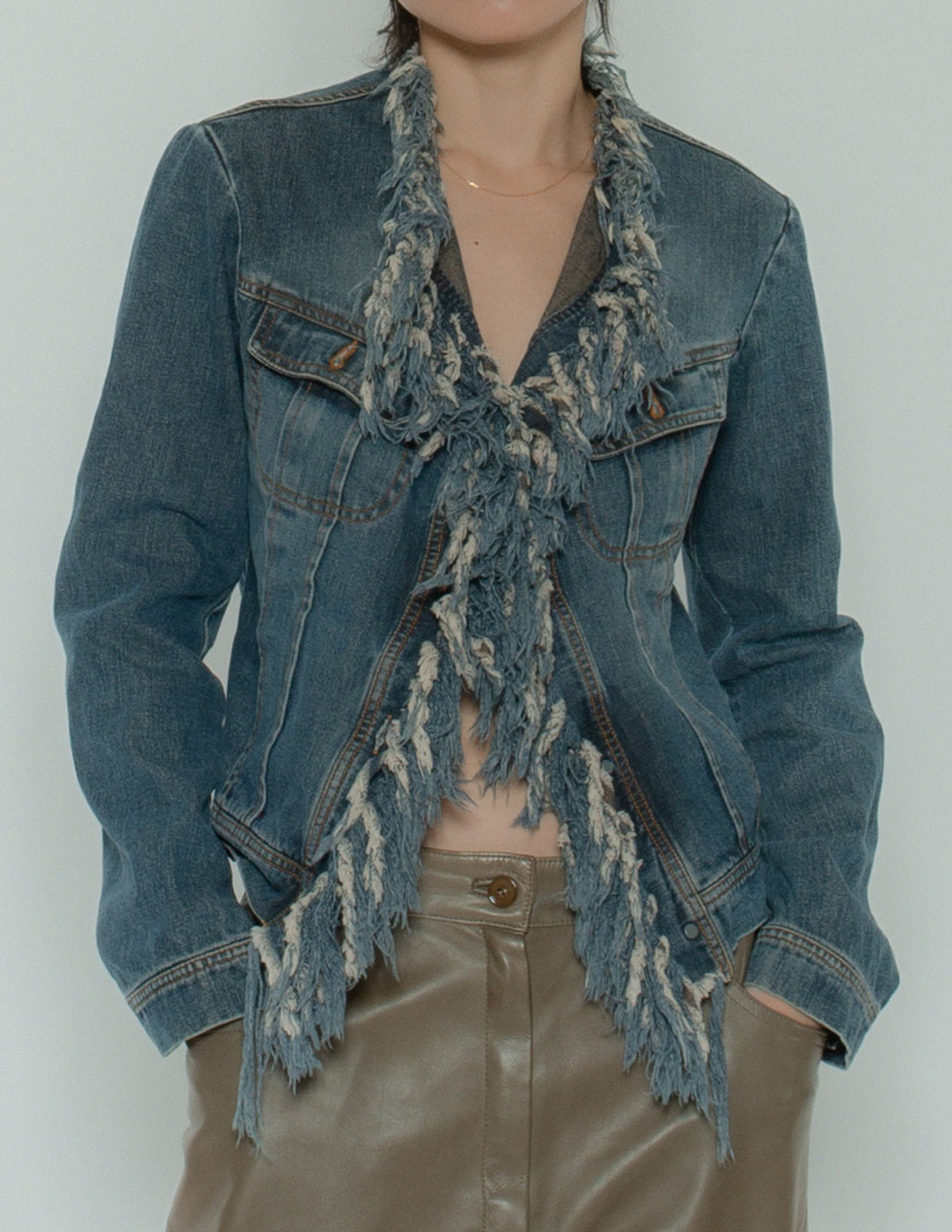 vintage denim jacket with fringe trim