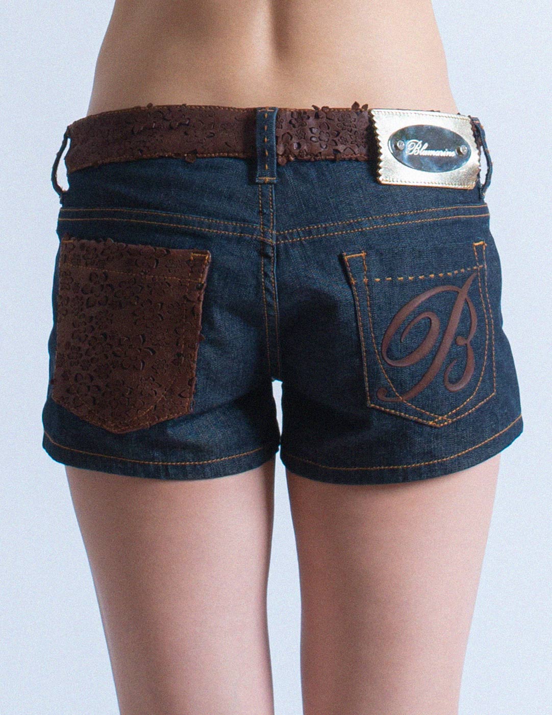 denim shorts with leather trim