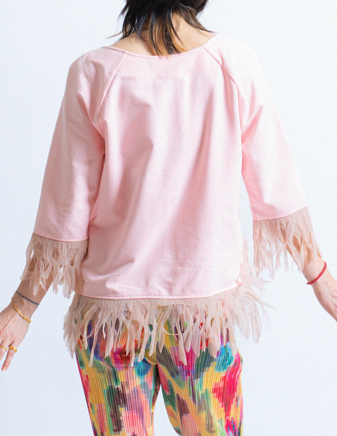 pink cotton top with tissue paper fringe