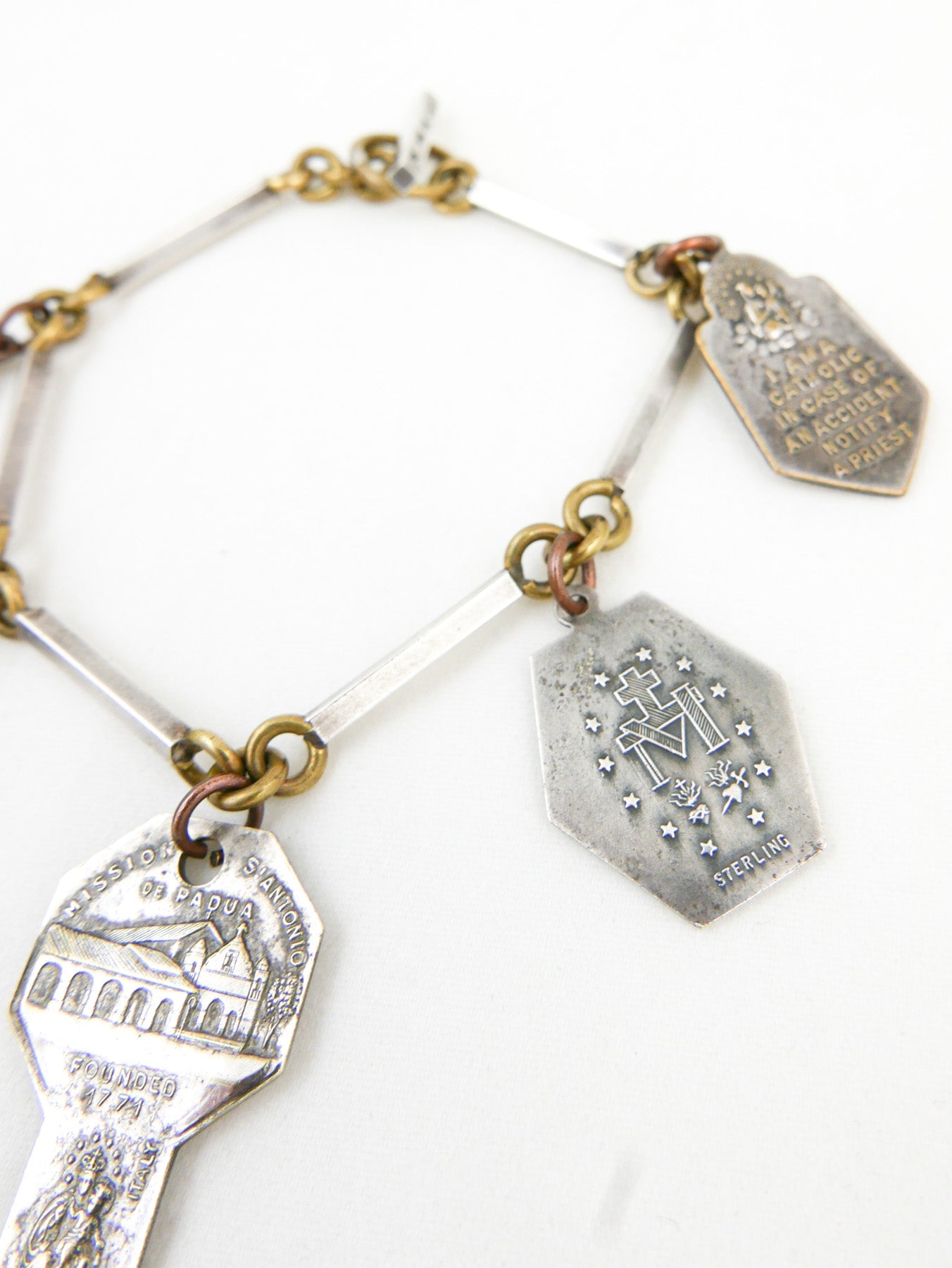 Sterling & Bronze Saints Charm Bracelet